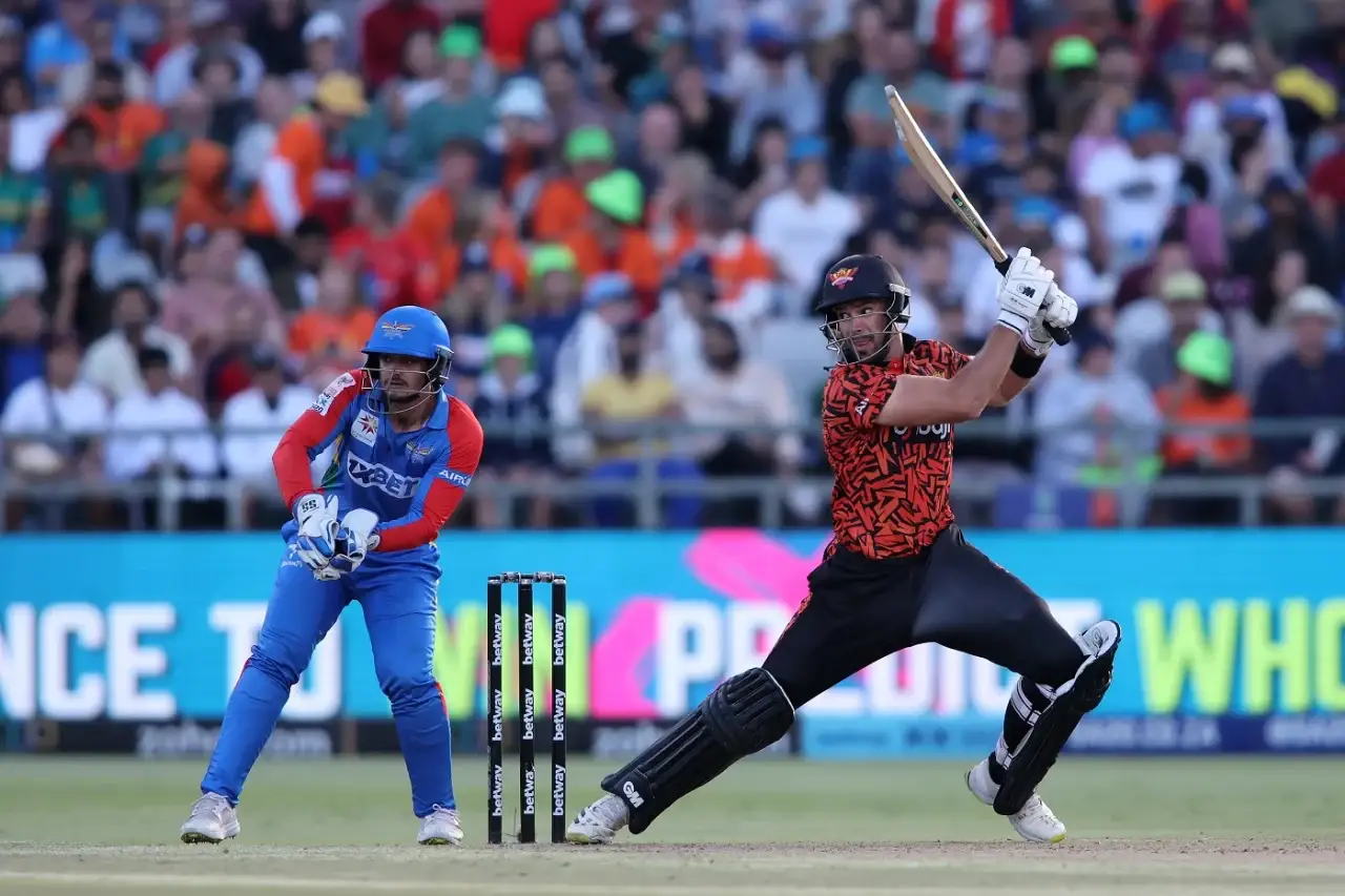 Sunrisers' Eastern Cape's captain Aiden Markram playing a cut as Durban's Super Giants Quinton de Kock looks on