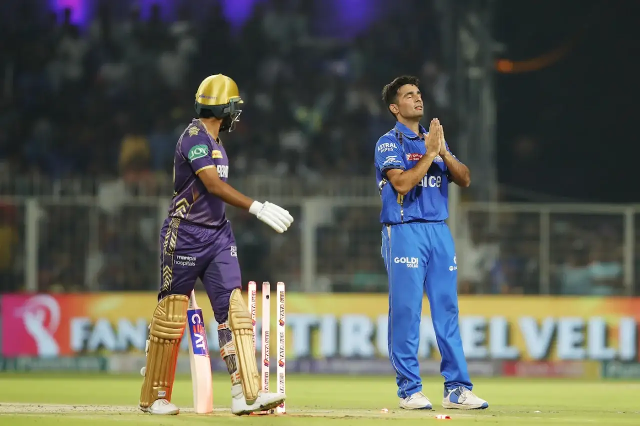Mumbai Indians' Anshul Kamboj celebrating his first IPL wicket
