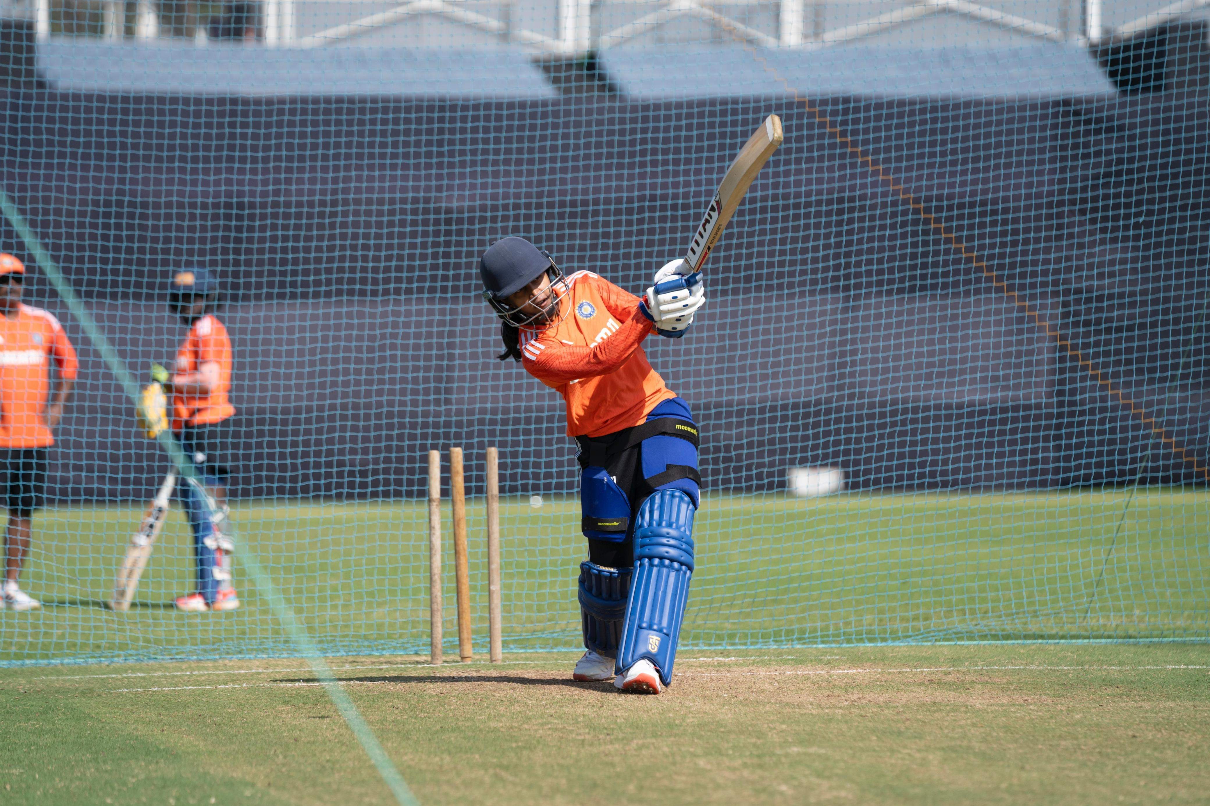 Niki Prasad playing a shot during practise 
