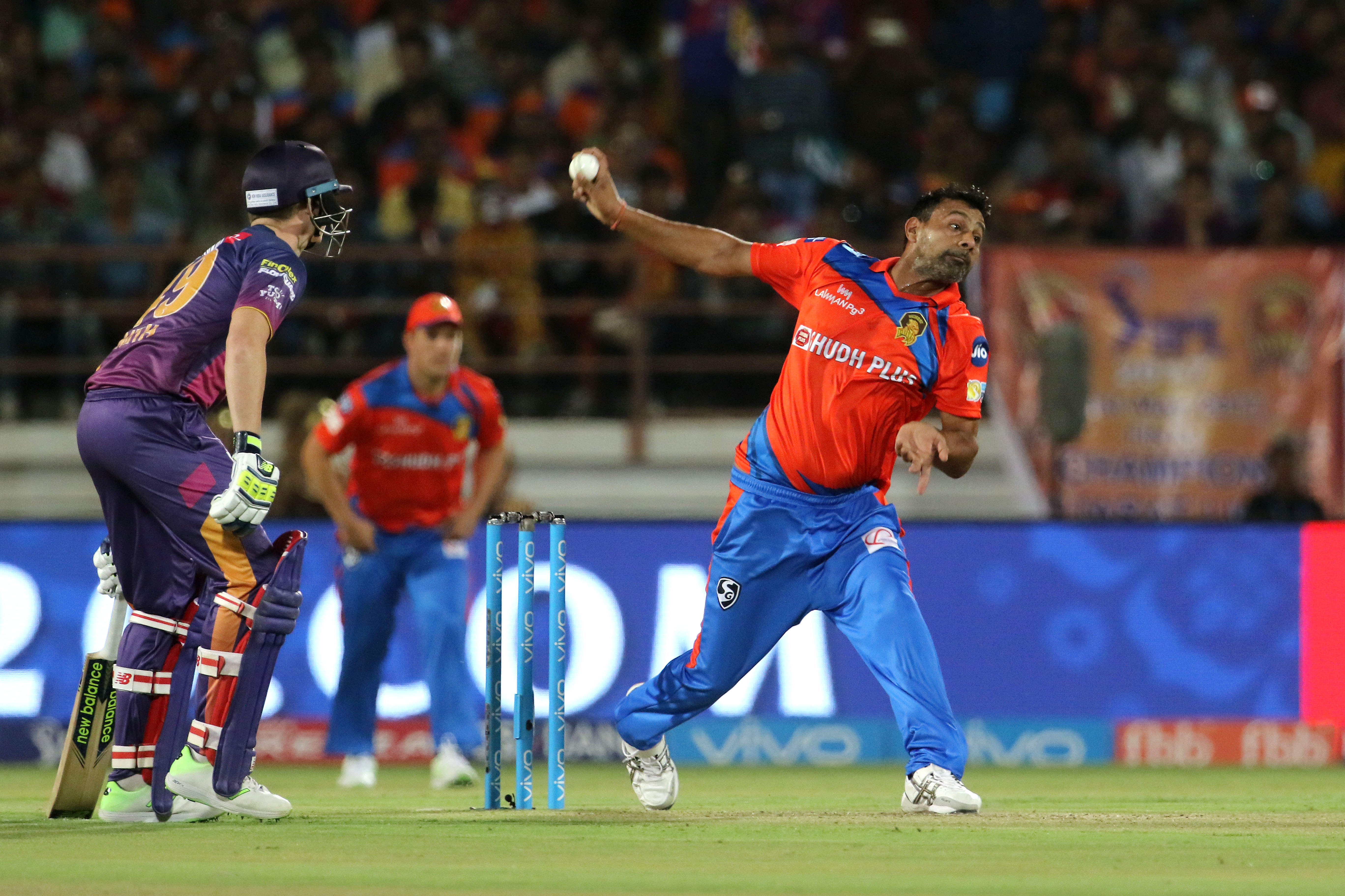 India's Praveen Kumar bowls in the Indian Premier League (IPL) 