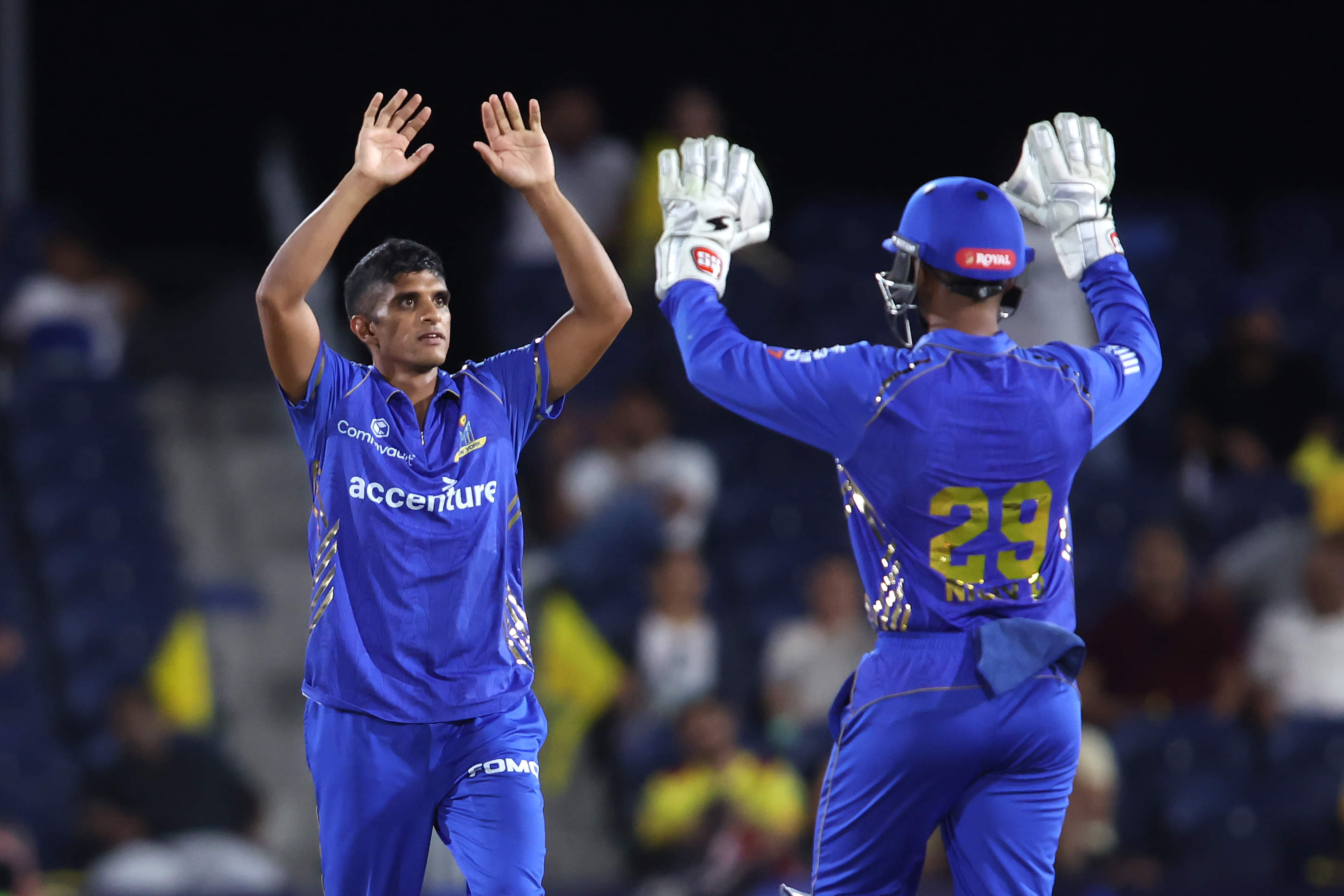 Nosthush Kenjige if MI New York with Nicholas Pooran in MLC