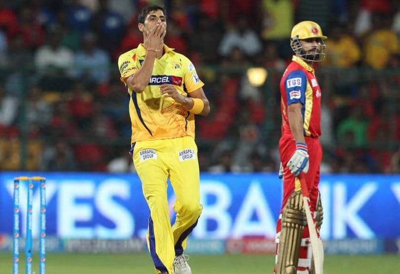 Ashish Nehra celebrating Virat Kohli's wicket while playing for CSK