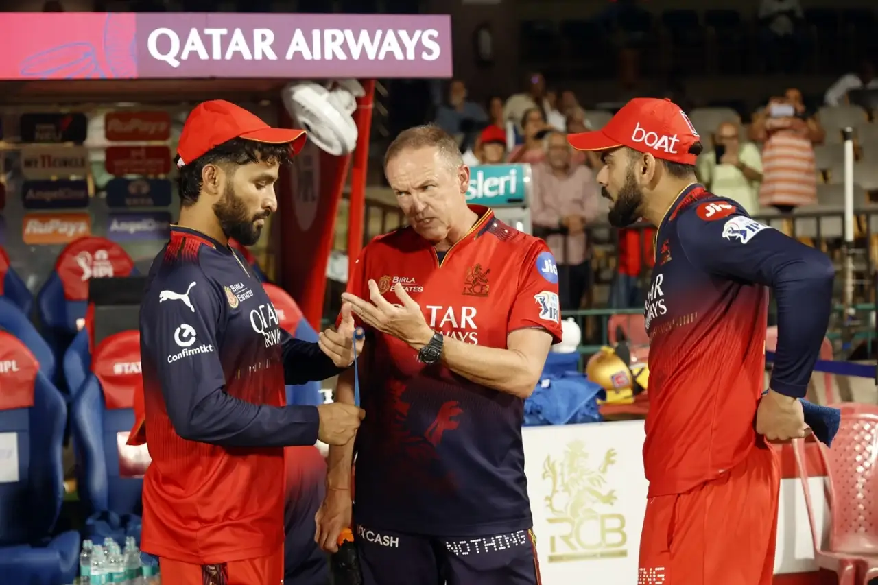 Rajat Patidar with coach Andy Flower and RCB's former skipper Virat Kohli