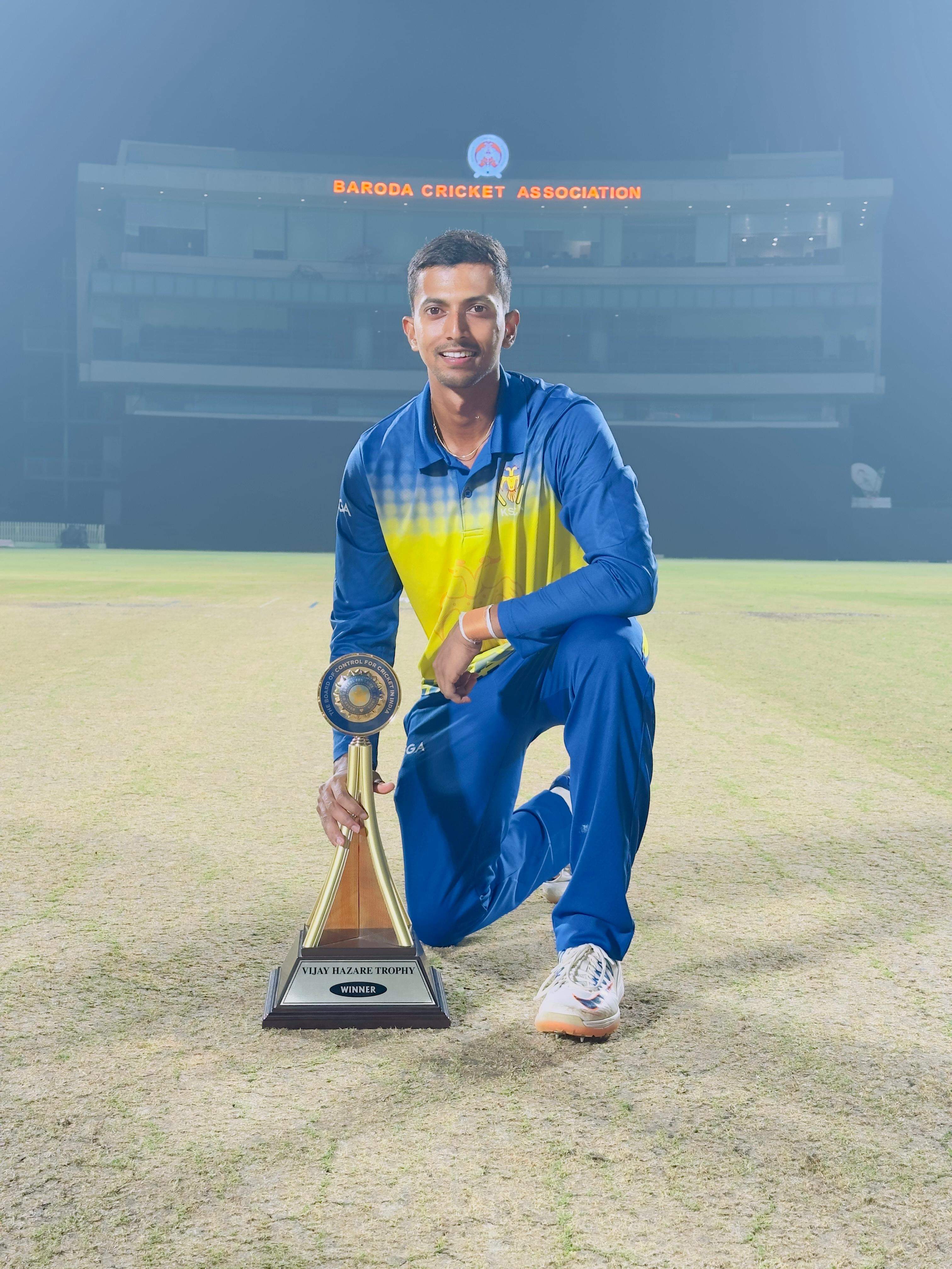 KL Shrjith poses with VIjay Hazare trophy after Karnataka bested Vidarbha in the final