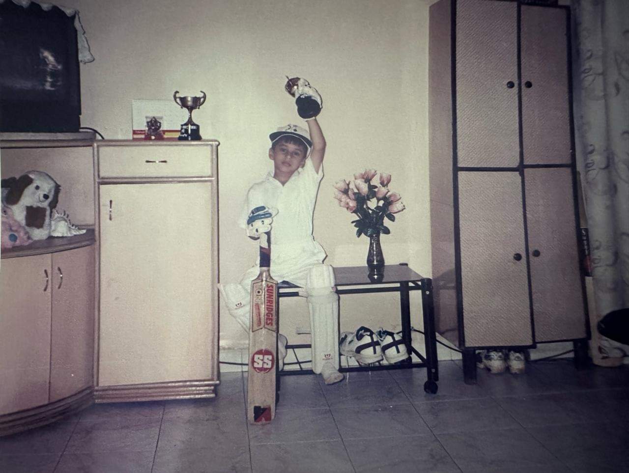 Tanush Kotian as a child growing up playing cricket