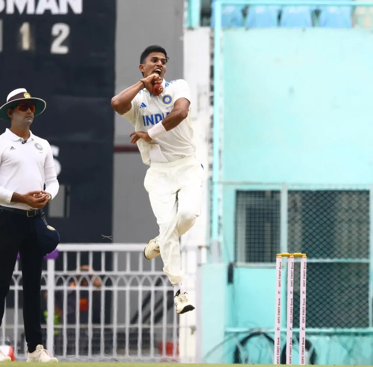 Tanush Kotian bowling for India A in the clash against Australia A