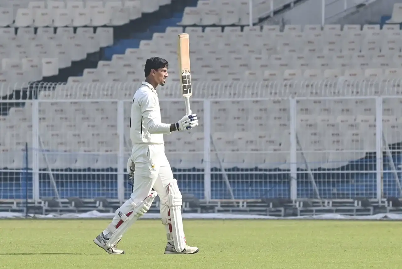 Tanush Kotian rising the bat for Mumbai