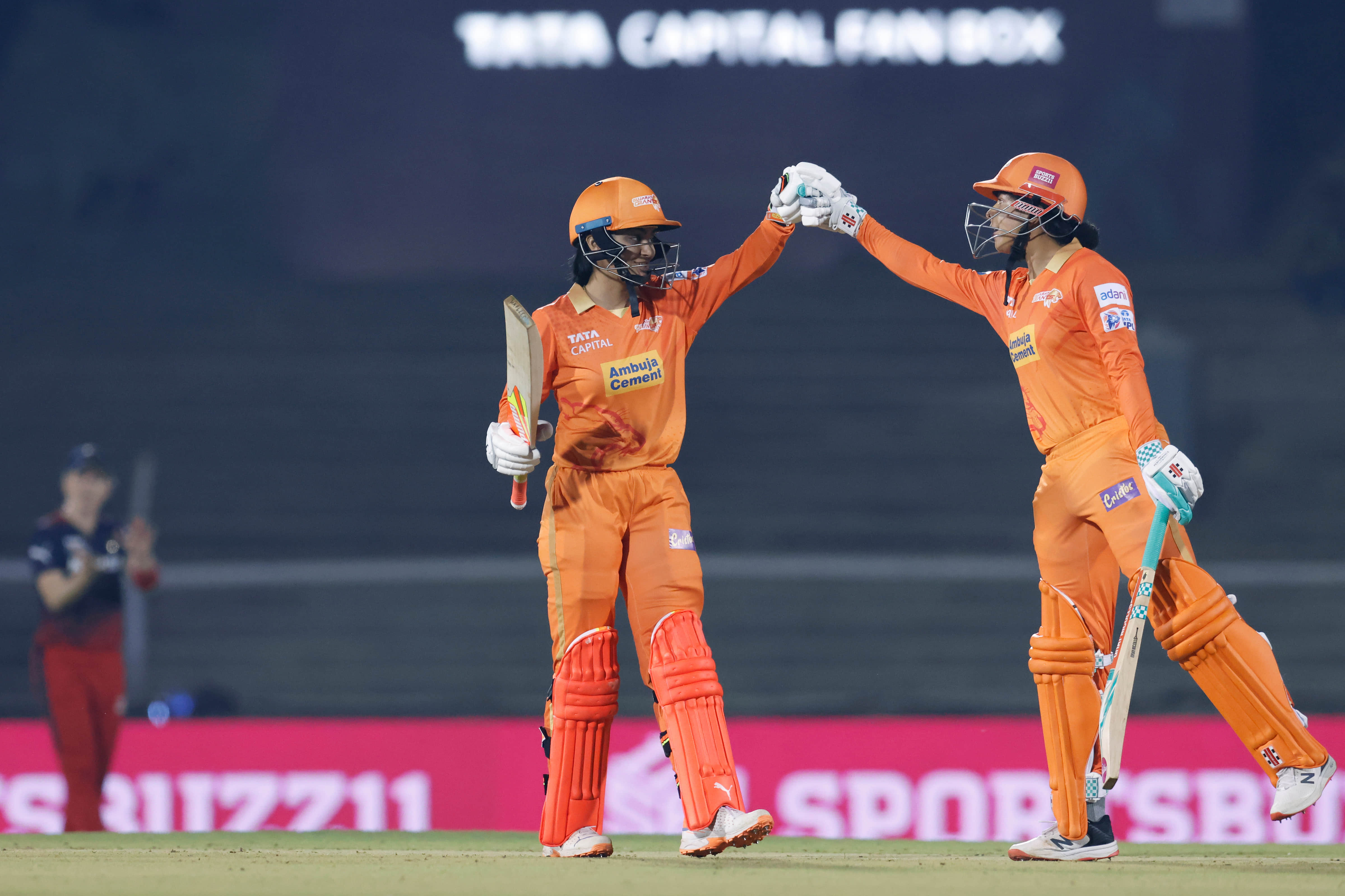 Gujarat hold their nerves to win high-scoring battle