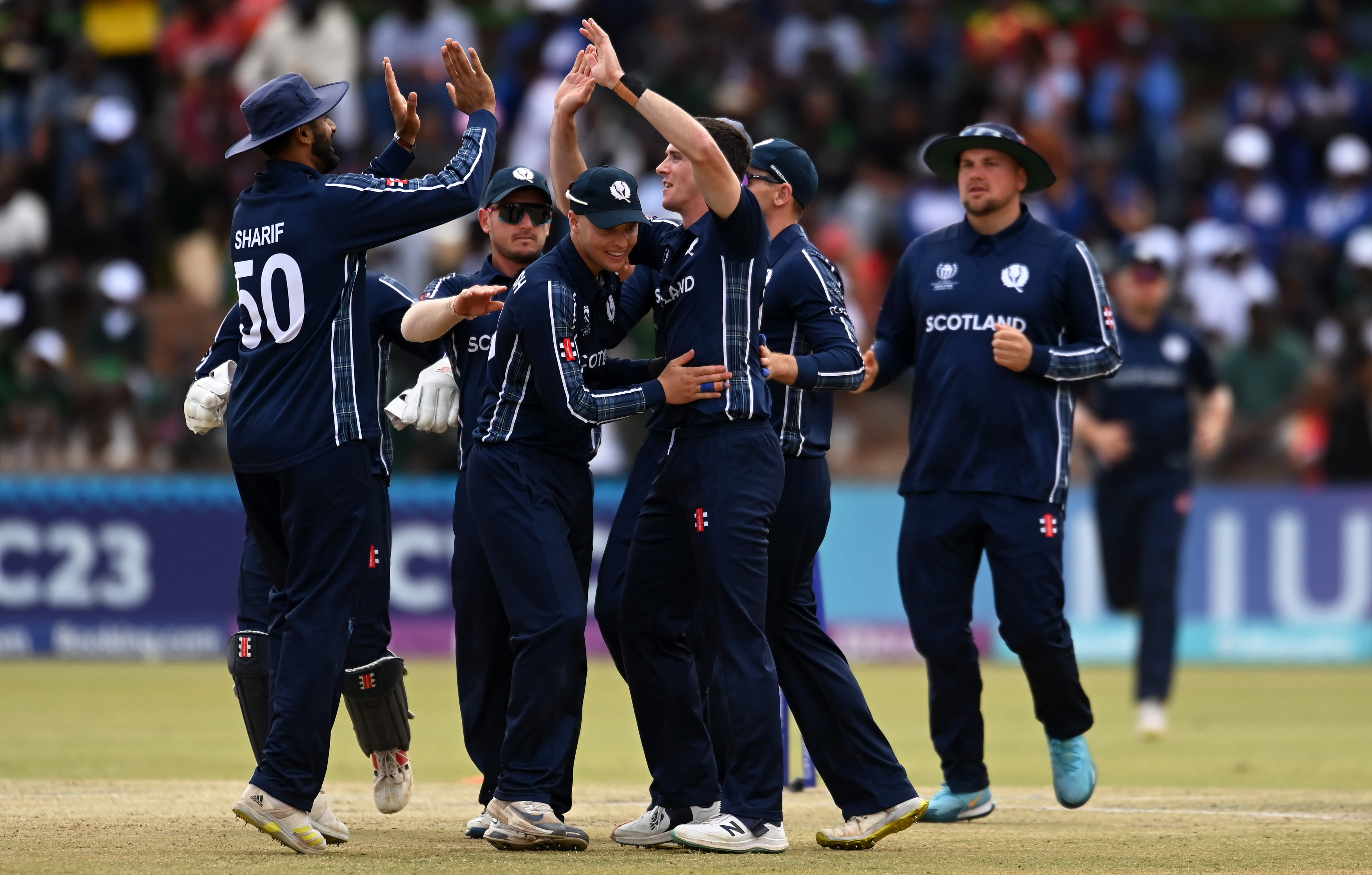 Scotland survive to fight another day; Zimbabwe knocked out
