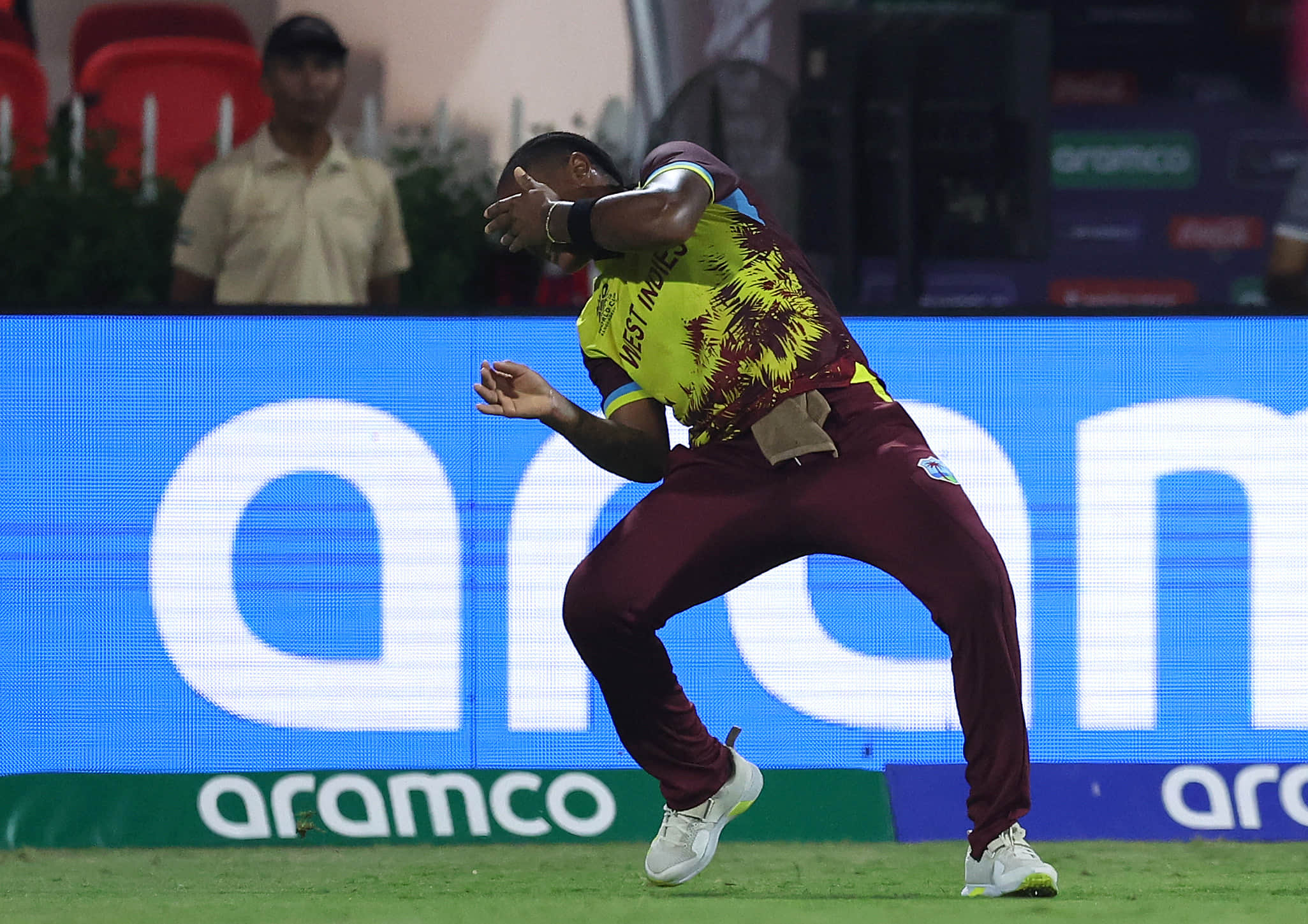Chinelle Henry leaves the field after getting hit on her face