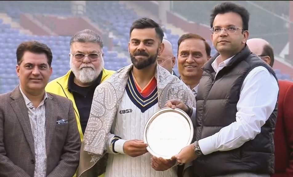 Why was Virat Kohli felicitated by DDCA during Ranji Trophy match?
